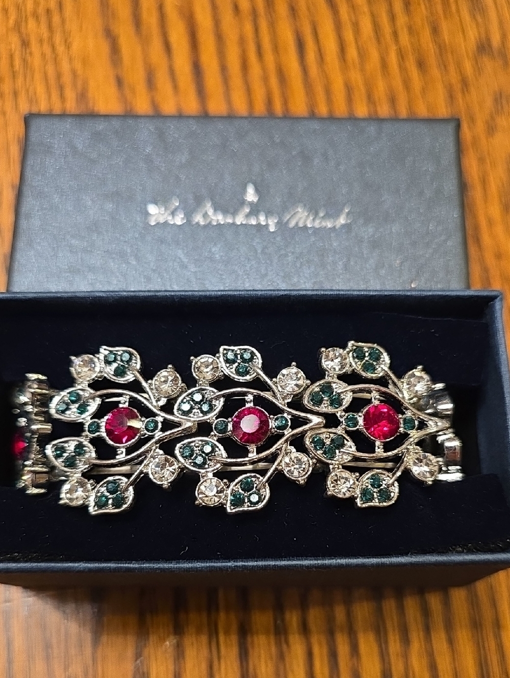 Silver-Tone Floral Bracelet with Red and Green Stones